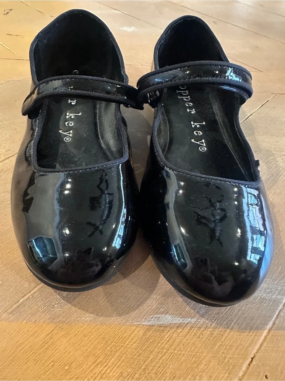 Classic Copper Key kids’ black patent Mary Jane flats in Size 5M